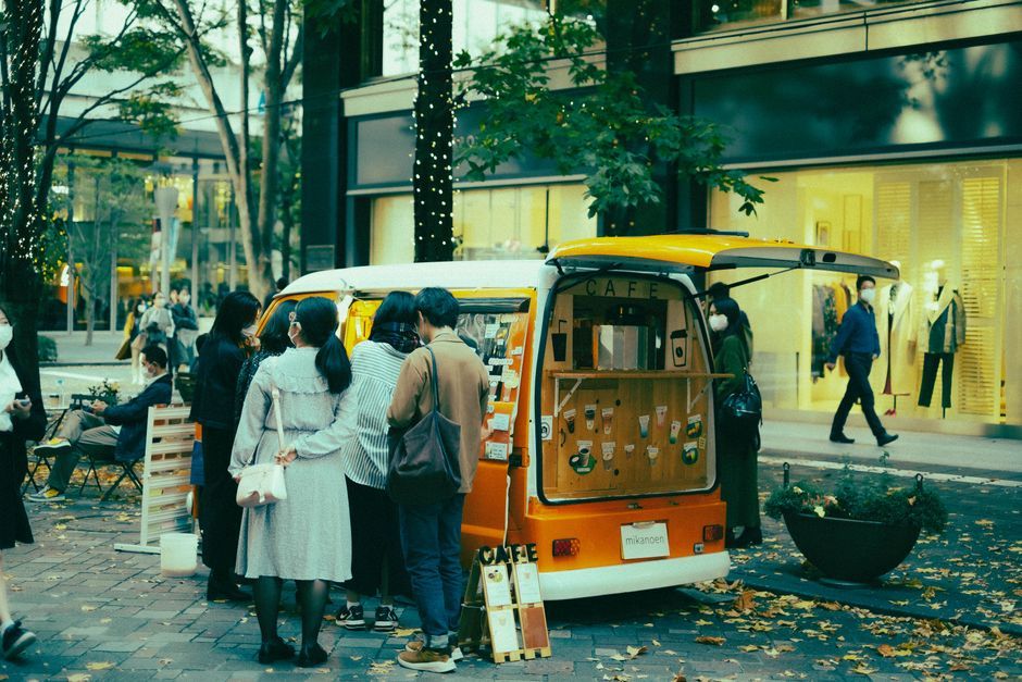 people queueing outside dessert shop UK