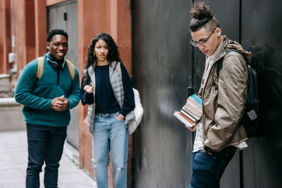 young adults college students campus conversation