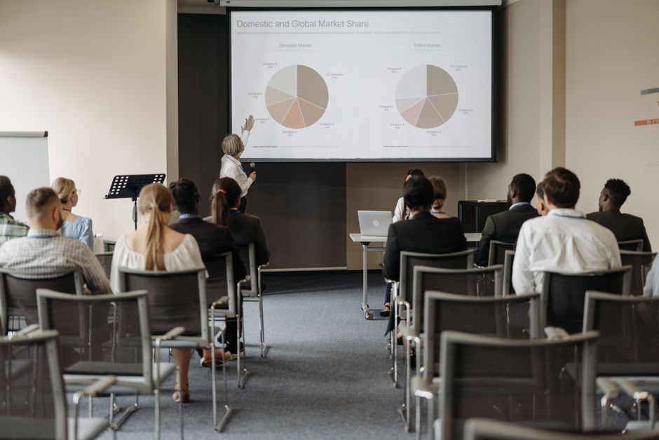 business conference speaker presentation screen daytime