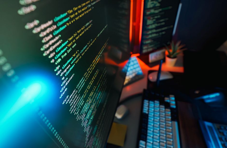 software engineer workspace computer screen code data analytics