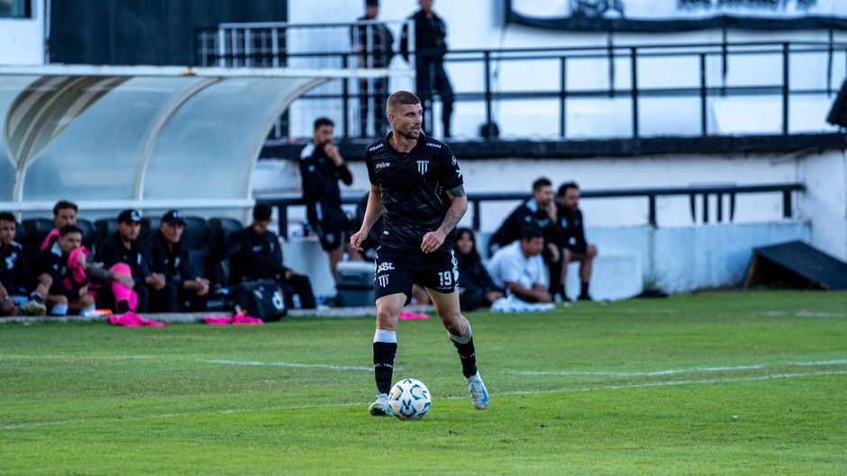 professional football player stadium match action