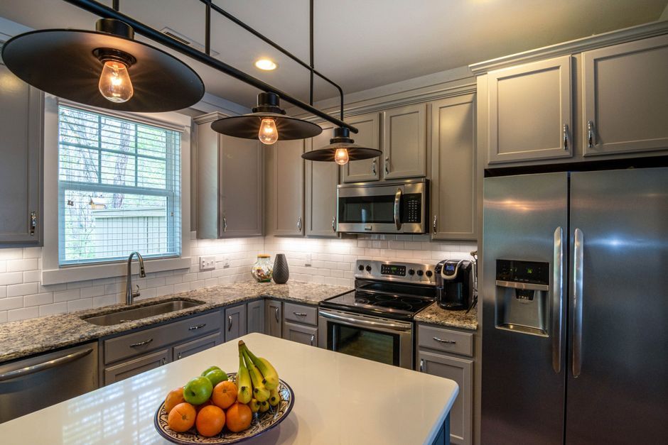 kitchen appliance showroom display refrigerator microwave