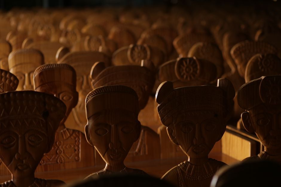 Ghanaian wooden sculptures industrial art installation