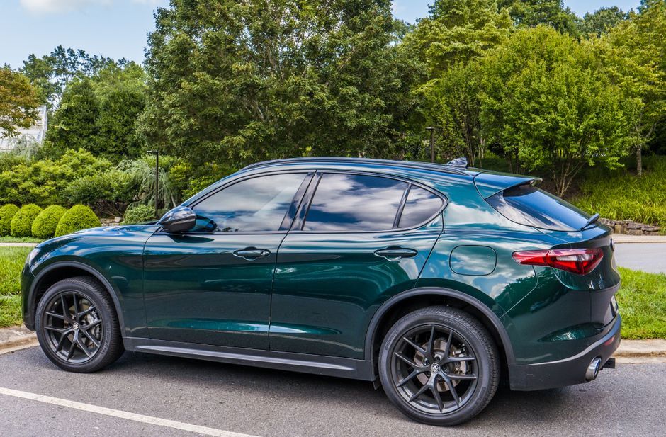 modern luxury electric vehicle exterior side profile