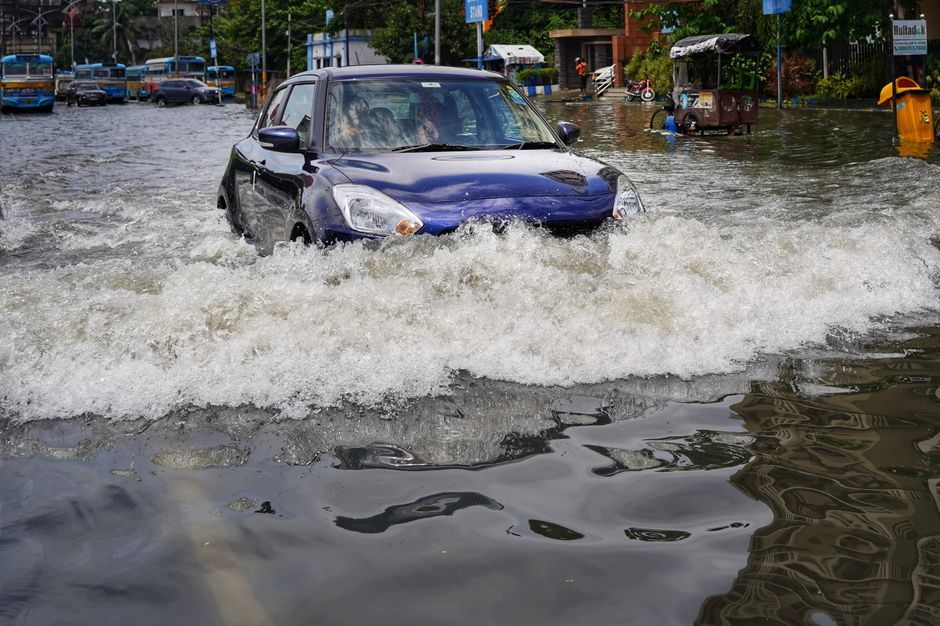 Thailand flooded street traffic heavy rain