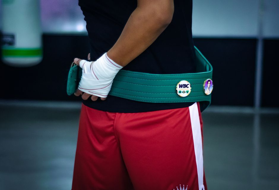 boxing championship belt stadium celebration