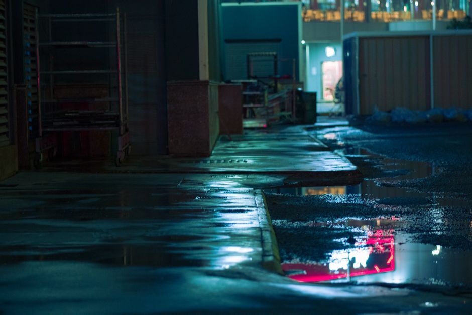 dystopian city street cinematic lighting