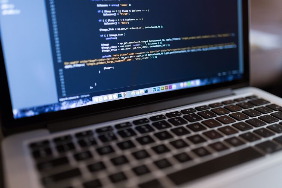 php programming code laptop screen close up