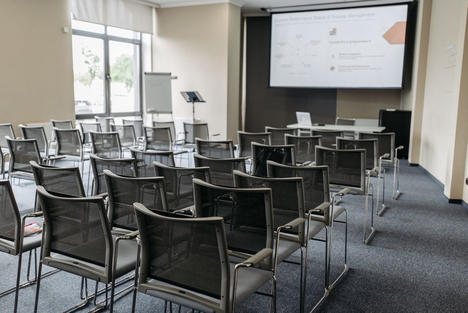 corporate meeting room presentation screen daytime
