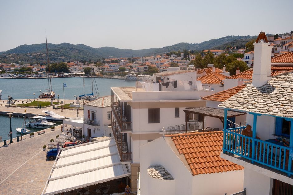Greek island historic harbor street Greece