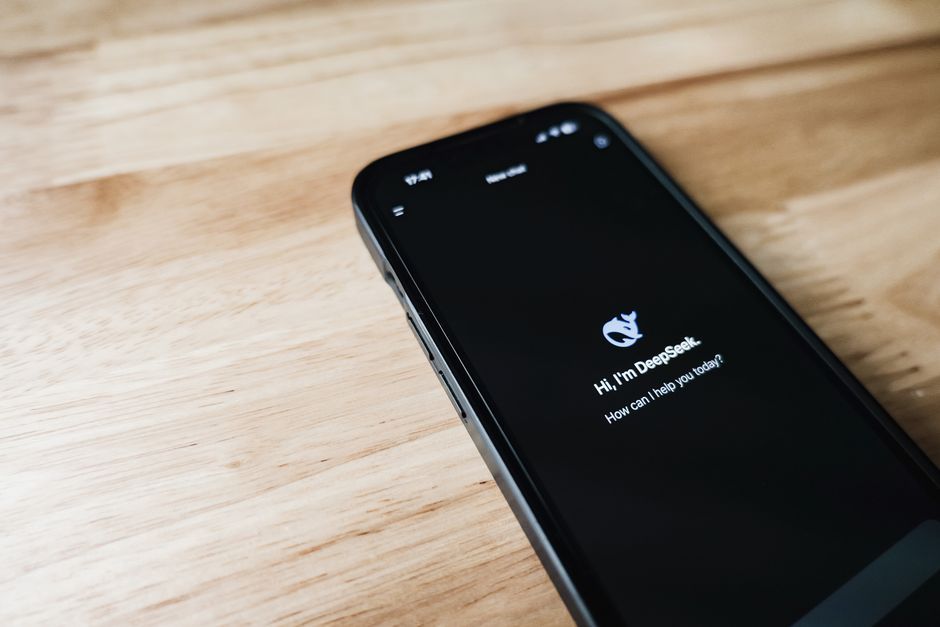 mobile phone running AI application screen