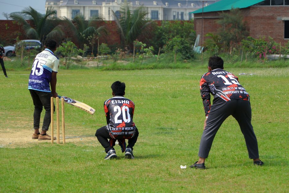 cricket match player field