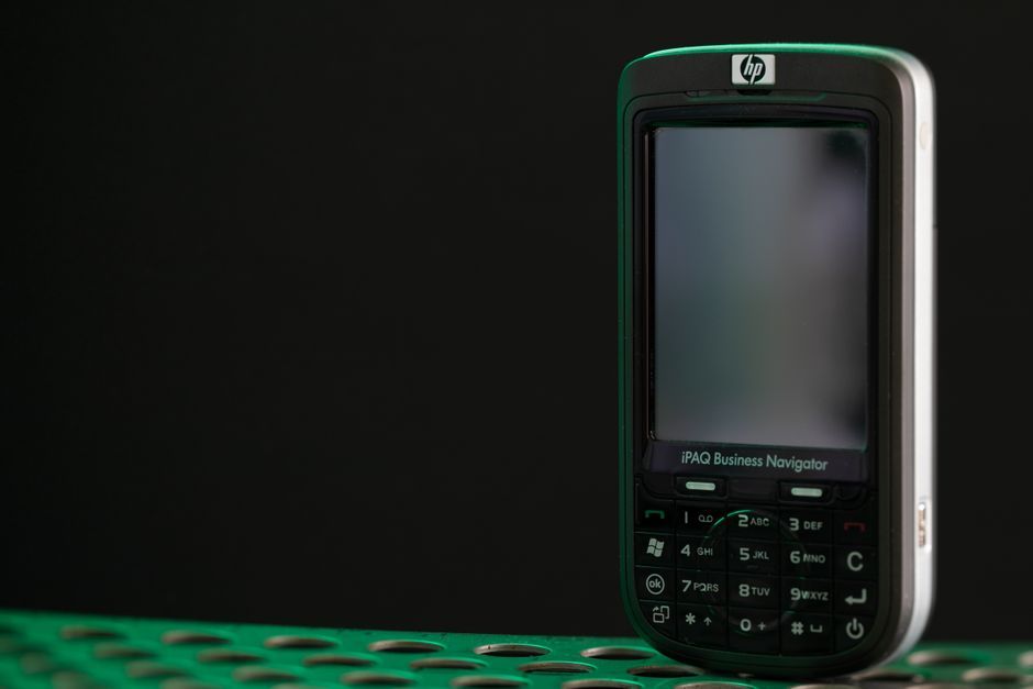 small pocket sized digital companion device concept close up
