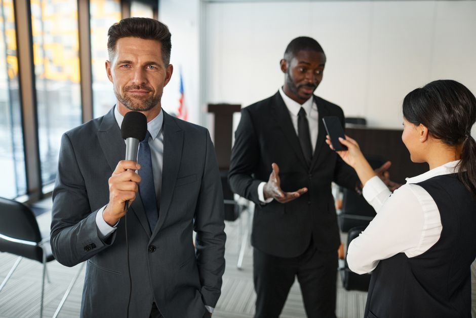 business press conference microphone media interview
