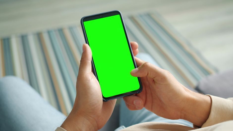 person holding smartphone vertically