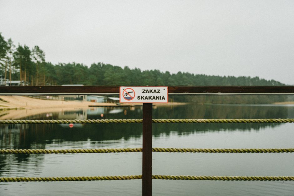 lake warning sign summer water