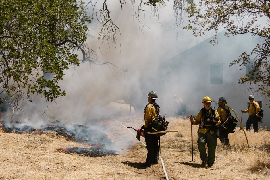 firefighters battling wildfire smoke