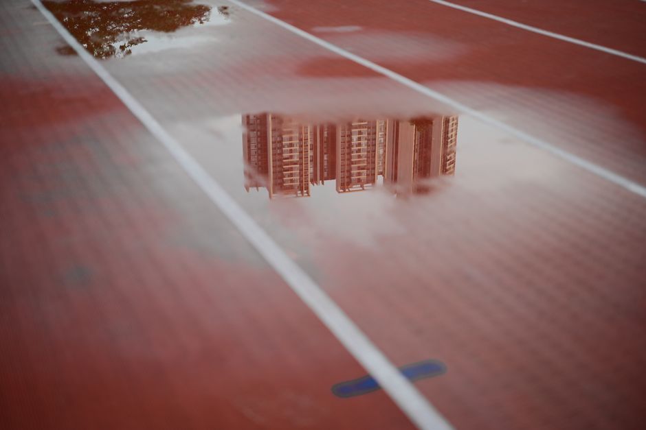 athletics track puddle rain