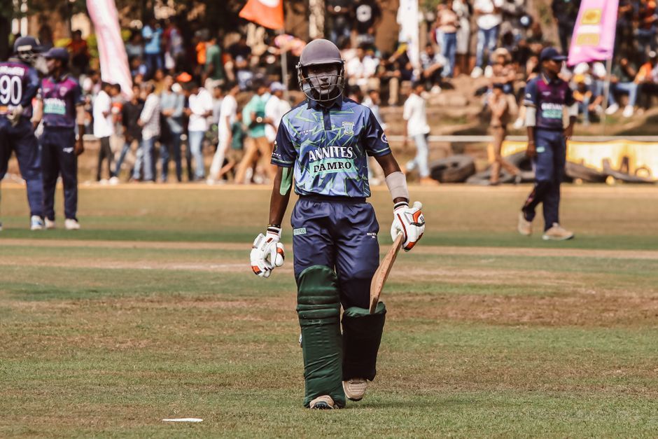 cricket match action stadium