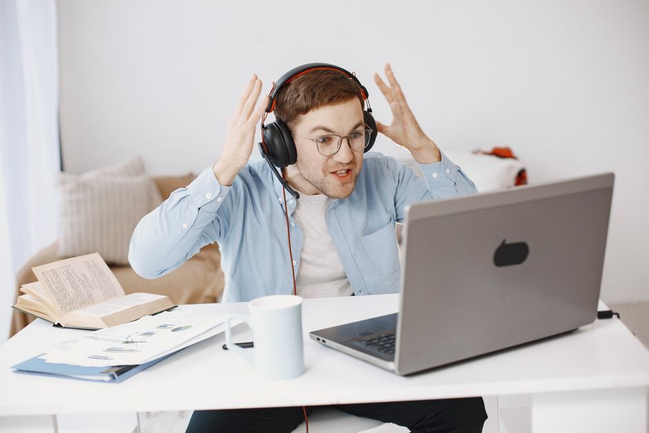 frustrated young jobseeker laptop
