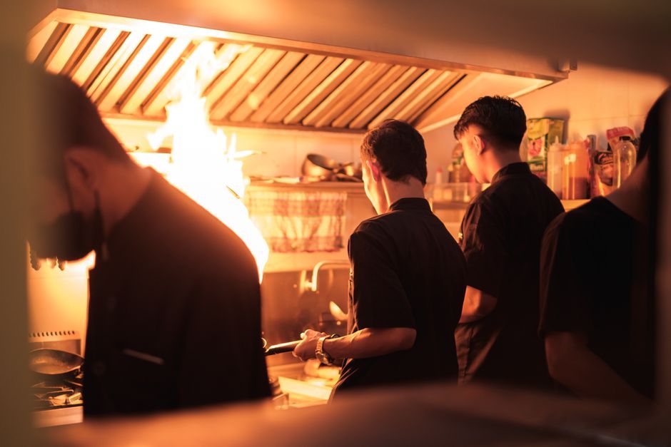 stressed chefs working in a busy kitchen