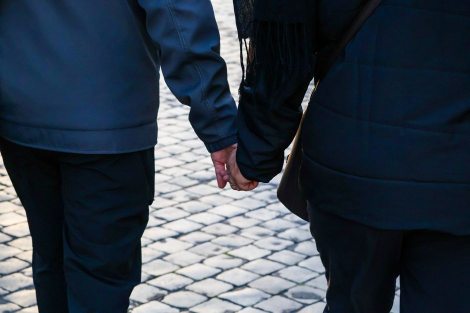 romantic couple holding hands