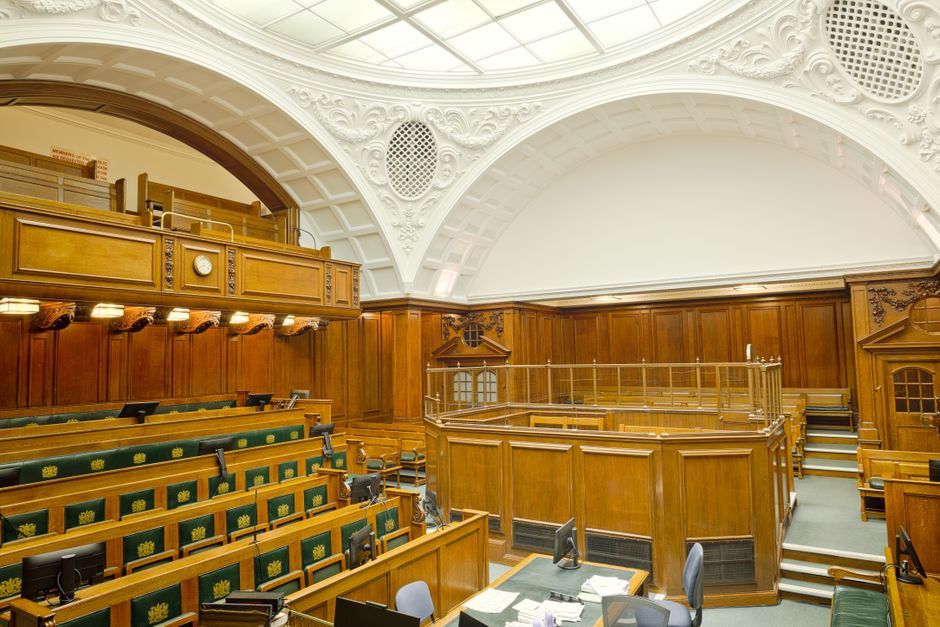 lawyer barristers arguing in court building UK