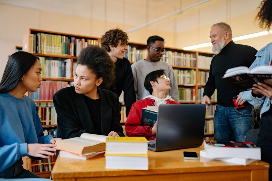 university students studying in library