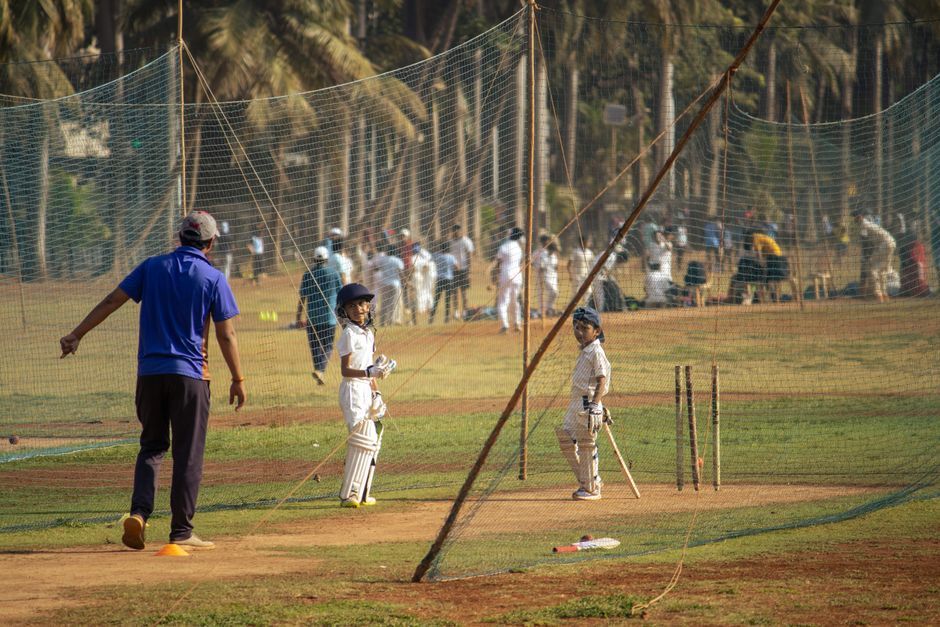 cricket coach talking to team