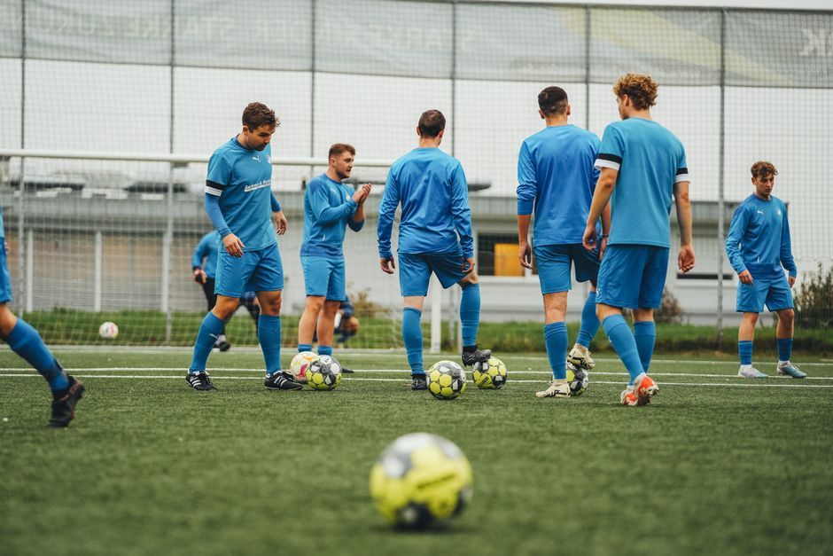 football players training pitch