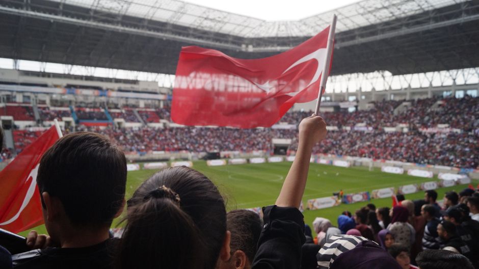 football fans welcoming player stadium Turkey