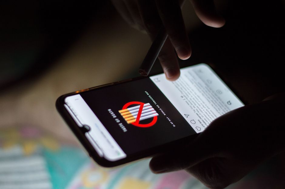 smartphone social media warning screen Thailand