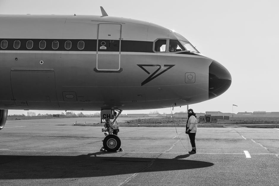 White House press secretary aircraft tarmac