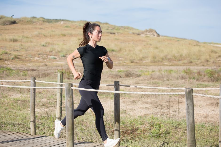 person running outdoors fitness training