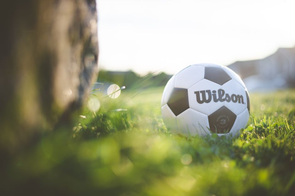 soccer ball grass field close up