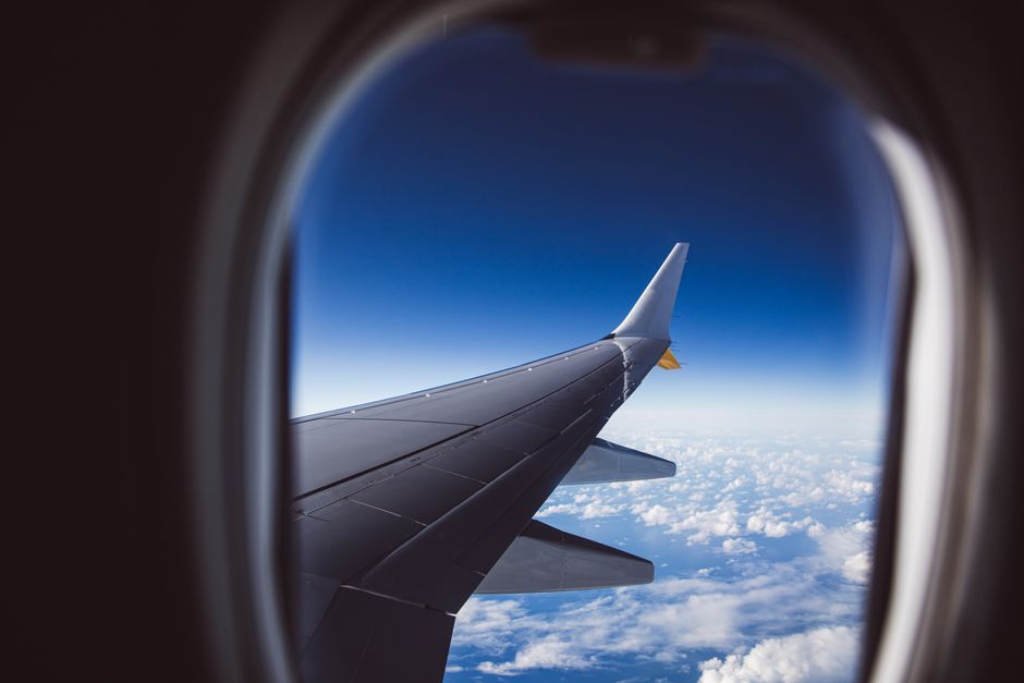 commercial airliner wing sky flight