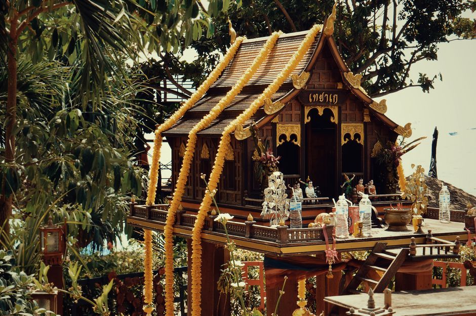 Thai temple shrine traditional offerings Thailand