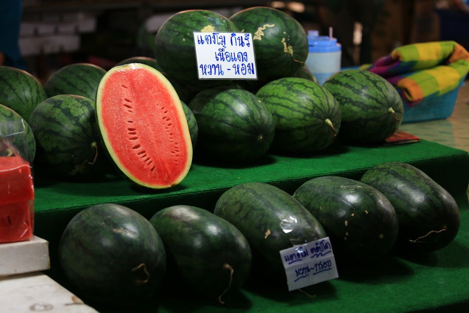 ripe watermelon cut open red flesh Thailand