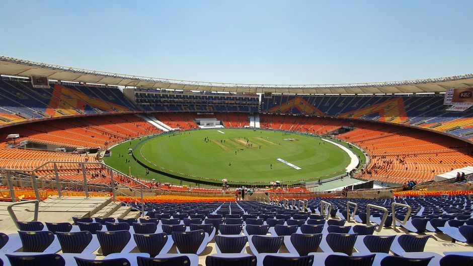 cricket match stadium crowd daylight