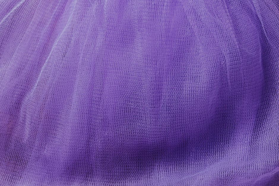 purple textile fabric material close up