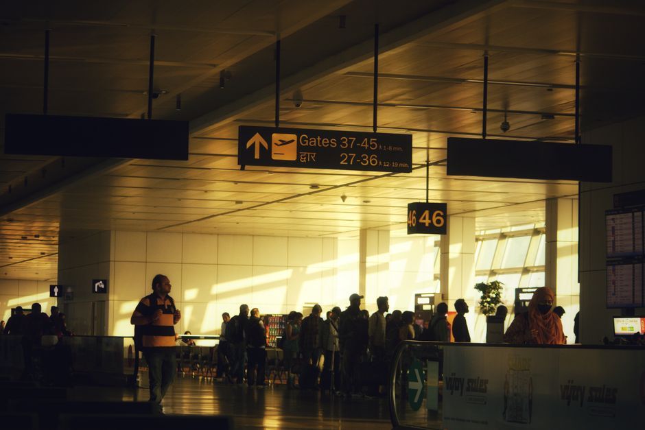 London Gatwick airport terminal departure board crowd