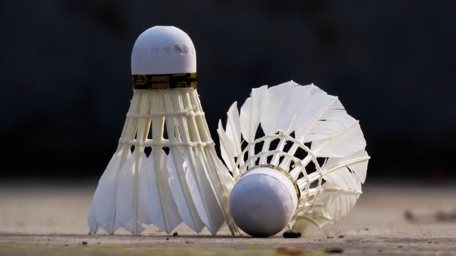 badminton shuttlecock racket court close up