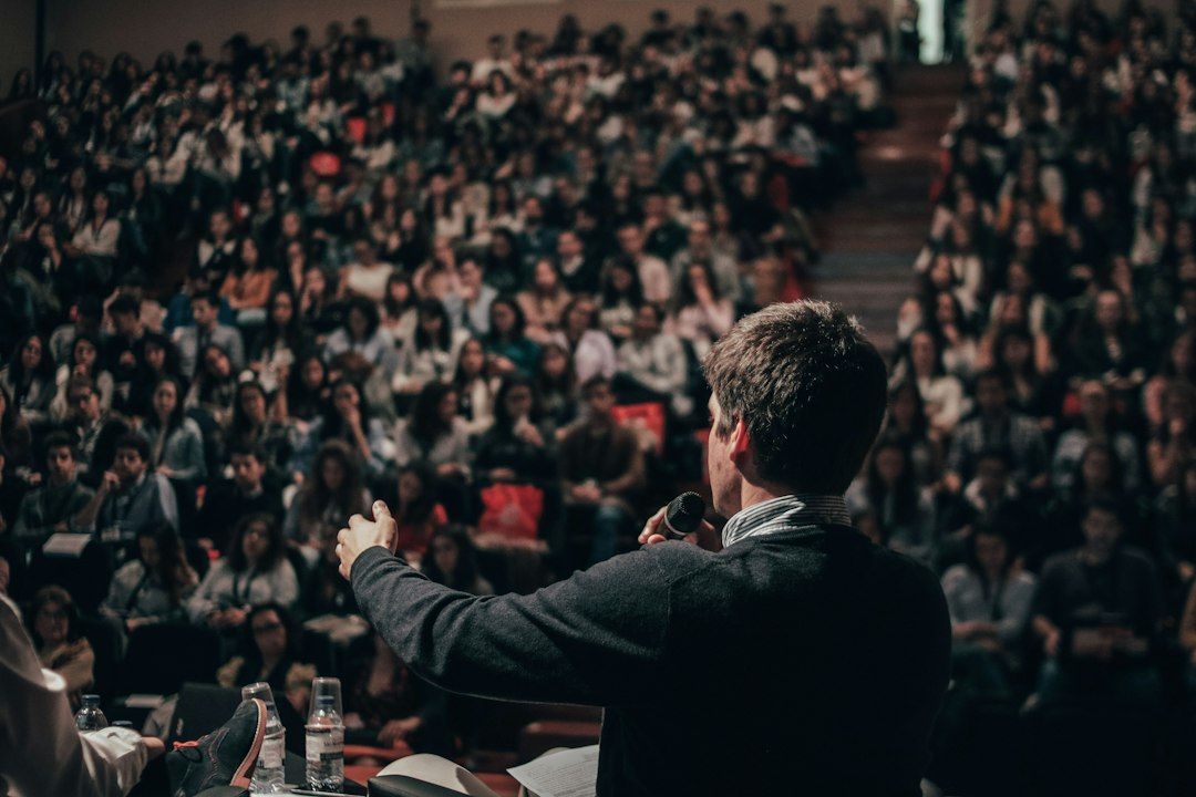 business conference speaker presentation screen daytime