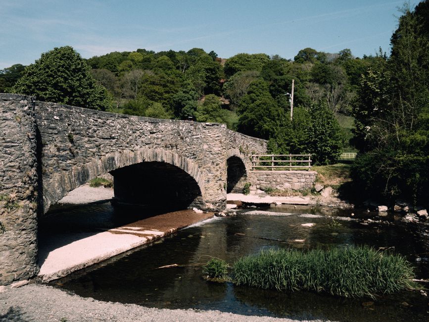 Wales village river flood rural landscape bridge