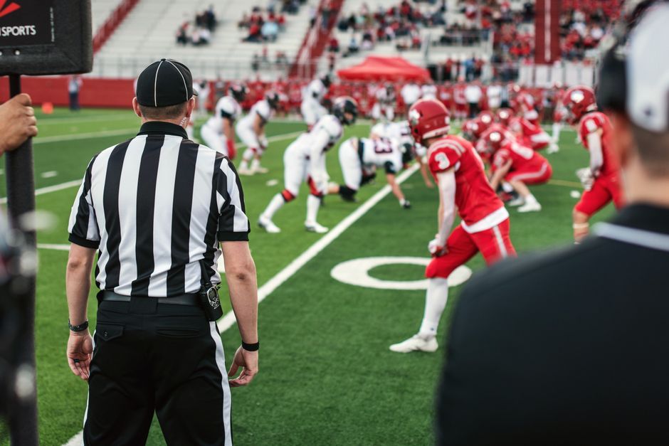 association football referee coach pitch sideline
