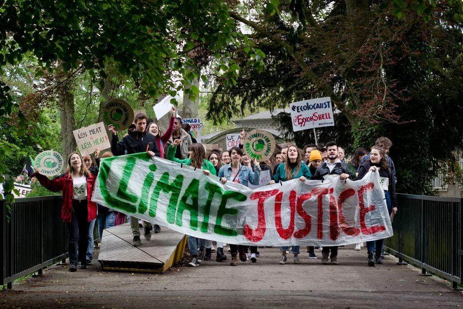 France student protest crowd banner street