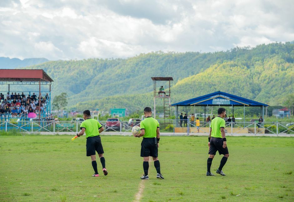 soccer stadium referee official corporate meeting UK