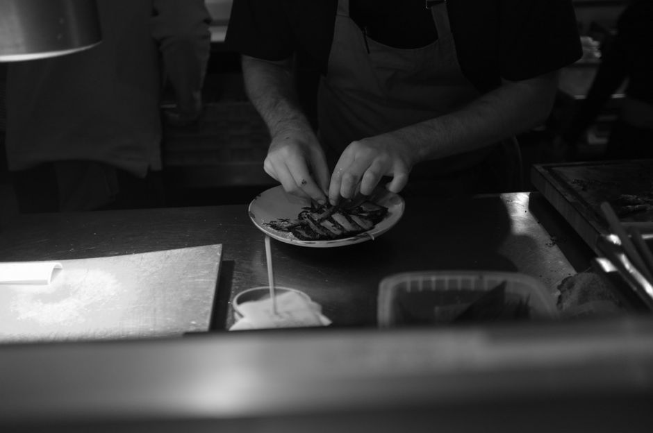 airline chef preparing gourmet food kitchen