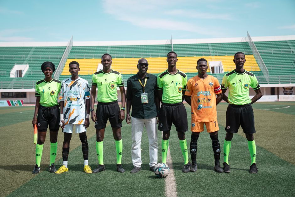 soccer match referee dispute stadium no team crest