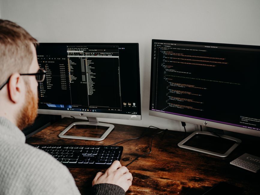 code computer screen developer workstation desk